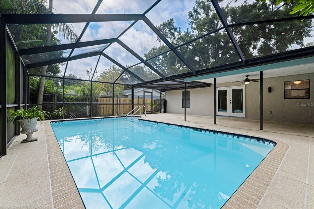 Photo of 1671 Castlewood Lane, Palm Harbor, FL 34683 (MLS # TB8542290)