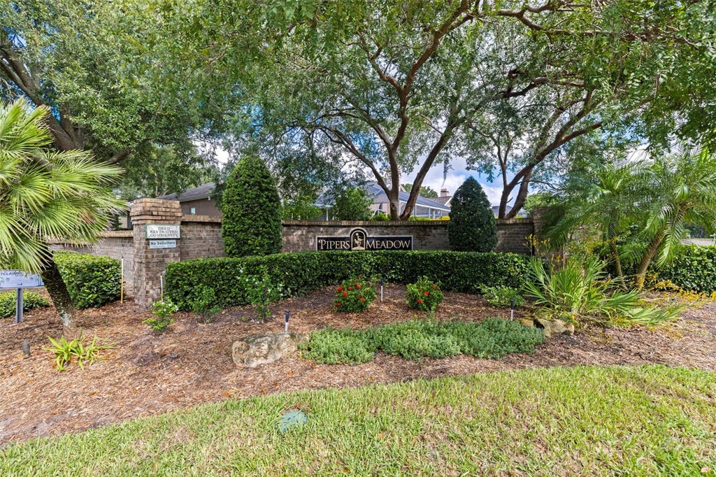 Photo of 1671 Castlewood Lane, Palm Harbor, FL 34683 (MLS # TB8542290)