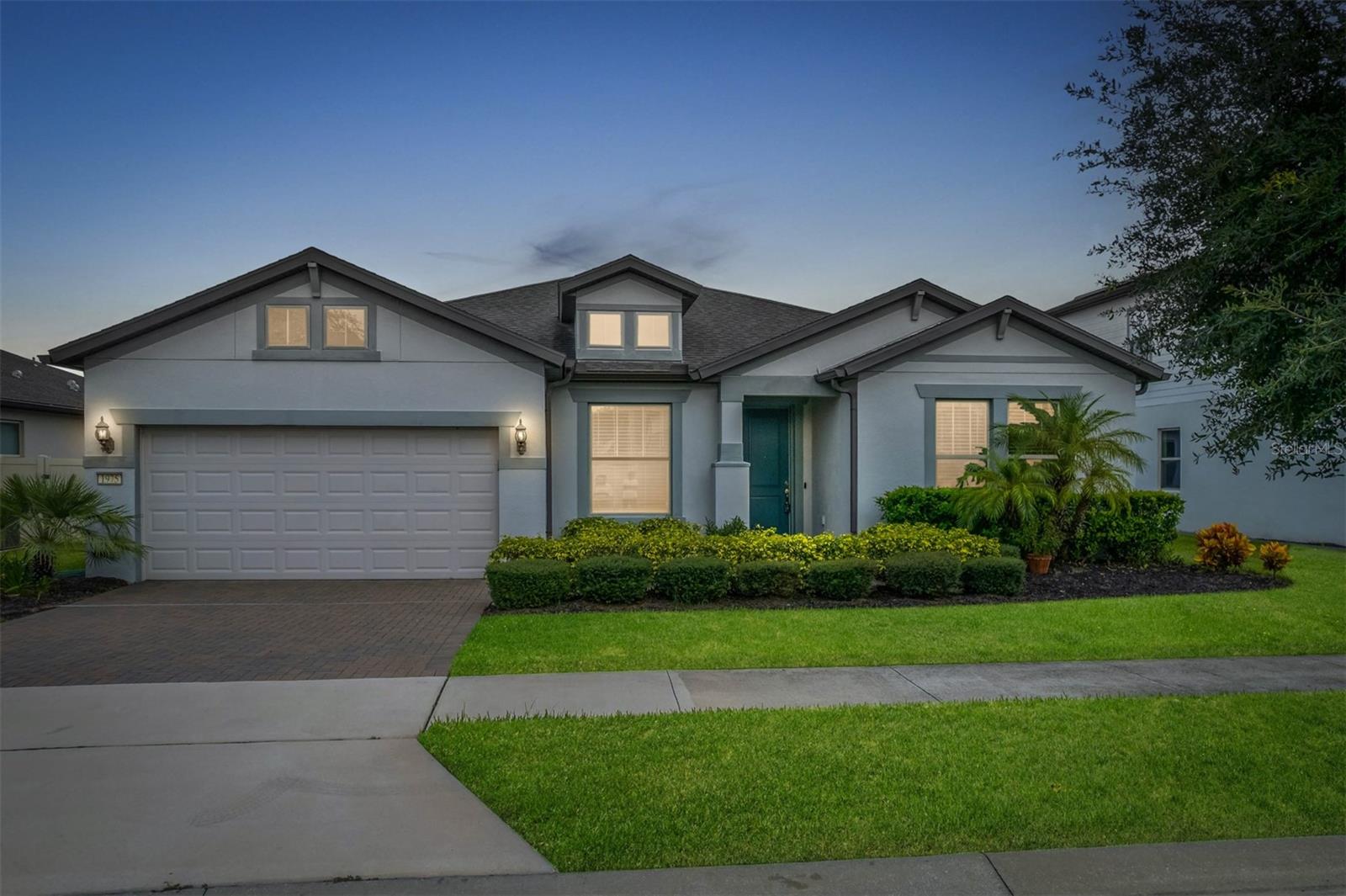 Welcome to Brookmore Estates, a private gated enclave where timeless design and modern convenience converge in one of Oviedo’s most desirable locations. From the moment you step inside, the home unfolds into a light-filled open concept with a dining room that seamlessly connects to the family room and breakfast nook, creating the perfect setting for both intimate gatherings and lively entertaining. The gourmet kitchen serves as the true centerpiece, boasting sleek quartz counters, a large center island with breakfast bar seating, custom cabinetry, and premium stainless steel appliances that cater to both everyday living and special occasions. The owner’s suite is a serene retreat with elegant tray ceilings, dual quartz vanities, an elongated walk-in shower, and a spacious walk-in closet, while the additional bedrooms are generously sized to accommodate family or guests. A covered patio extends the living space outdoors, offering a peaceful pond view as the backdrop to Florida evenings. Tucked within an exclusive community of only 53 homesites and minutes from shopping, dining, UCF, and major roadways, this residence is more than a home—it is a lifestyle of comfort, sophistication, and unrivaled convenience.