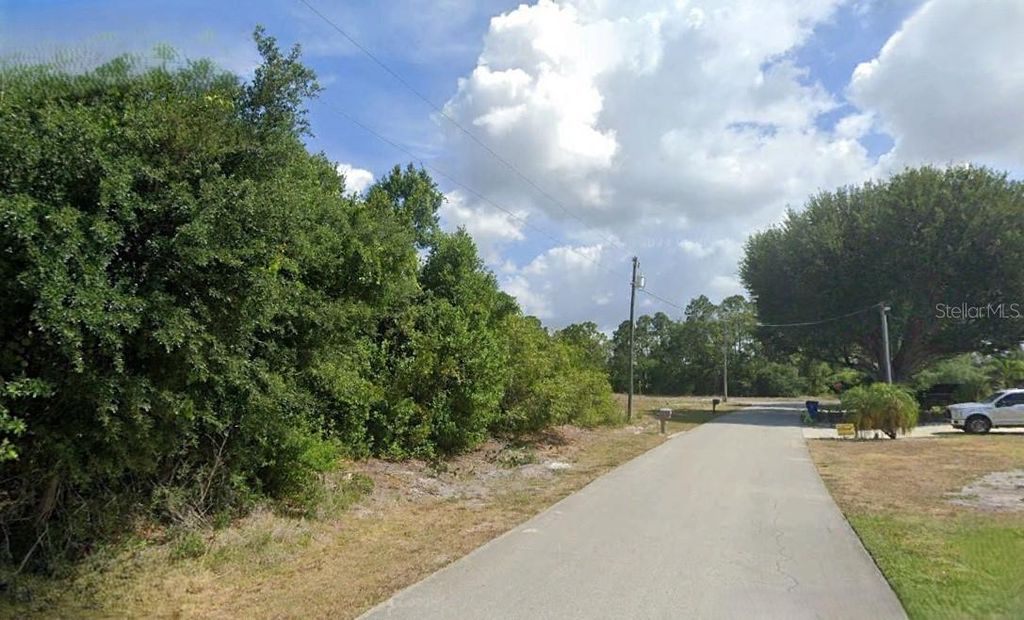 Photo of 1018 Gardenia Street, Lake Placid, FL 33852 (MLS # O6285638)