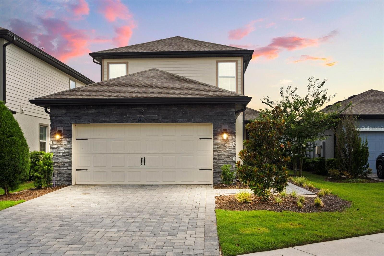 Live Where Others Vacation – Welcome to Reunion Village! This is more than just a home — it’s a lifestyle upgrade in one of Central Florida’s most sought-after resort-style communities. Within the magical, amenity-rich Reunion Village, this 4-bedroom, 2.5-bathroom, two-story residence is everything you want — whether you’re seeking a primary residence, second home or investment property in a dream location.
Just minutes from Disney, Universal Studios and SeaWorld and about an hour from Florida’s world-famous beaches, this gated community is a vacation destination all on its own.
Residents of Reunion enjoy exclusive access to: a 10-acre waterpark with thrilling slides, a lazy river, and splash zones, resort-style swimming pools and fitness centers, tennis courts with professional instruction, basketball courts and sports fields, scenic nature trails, playgrounds, and on-site dining, signature golf courses all wrapped in 24-hour secured, guard-gated peace of mind.
The best part? Monthly HOA dues cover nearly everything: lawn care, exterior maintenance and cleaning, cable, internet, phone, and more — making this a truly hands-off, turnkey ownership experience.
Inside, the home is equally impressive. The open-concept first floor features luxury vinyl plank flooring, sleek white shaker cabinets, quartz countertops and Whirlpool stainless steel appliances, a spacious walk-in pantry, stylish lighting and fixtures, and a Wi-Fi-enabled garage door opener for modern convenience.
The first-floor primary suite features tray ceilings, a walk-in closet and a spa-inspired bath complete with dual granite vanities and a large walk-in shower. Upstairs, you’ll find a loft and three additional bedrooms with plush carpeting throughout — perfect for family, guests, or a dedicated workspace.
Step outside to enjoy a nearly fully fenced backyard with lush landscaping — offering privacy and tranquility with room to relax or entertain.
Whether you’re looking to escape to a world of luxury on weekends or want to live like you’re on vacation every day, this Reunion Village gem is what dreams are made of. Schedule your private tour today — resort life awaits! Check out video tour in link attached