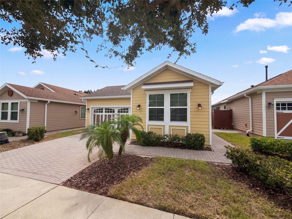 Photo of 394 Alcove Drive, Groveland, FL 34736 (MLS # O6448354)