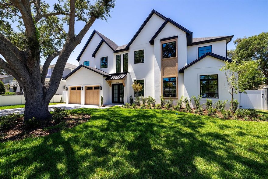 Move in Ready July 2023!  This beautiful design by Milana Custom Homes has 4,345 sqft of living space including 2 story foyer and family room.  Home has 5 bedrooms, 4 full baths and 2 half baths homes, 5th bedroom can easily be converted into a bonus room with a wet bar and a covered balcony. Entering through the custom iron front door to the Grand Foyer, you'll find the Den/Study to your right, the Mud Room/Laundry Room to your left and you'll be welcomed into the spacious Family Room. The 2 story Family Room has a gas fireplace with decorative wood details to the ceiling, access to a half bath and is open to the Kitchen. Find your walk-in pantry, nook area and large kitchen island here including quartzite countertops, Subzero refrigerator and Wolf range.  The Master Suite is located on the first floor including two walk in closets, two separate sinks, larger shower and private water closet. Before heading upstairs, make your way out to the backyard where you can enjoy your outdoor kitchen, covered lanai and pool with access to a pool bath.  The second floor is open to below and overlooks the Family Room and foyer. Up here you will find the 4 additional rooms each with their own bathroom access and walk in closet. The second laundry room can also be found here along with a wet bar and ice maker.  This home is block on block construction and includes icynene insulation and PGT impact glass windows. Centrally located with easy access to everything in South Tampa!