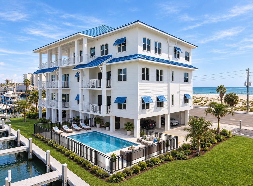 Photo of 13655 Gulf Boulevard #201, Madeira Beach, FL 33708 (MLS # TB8548114)