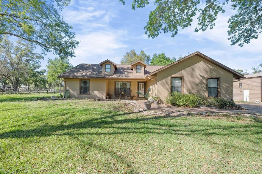 Experience the best of country living with this beautifully maintained, one-owner 3-bedroom, 2-bath home situated on approximately 3/4 of an acre. Offering both comfort and functionality, this property includes a spacious 36' x 40' metal shop equipped with electric, an RV hookup, and both 14 ft and 10 ft roll-up bay doors—perfect for hobbyists, storage, or small business needs.

Inside, the home features a desirable split-bedroom floor plan, laminate flooring throughout the main living areas, and tile in the kitchen and bathrooms. The home has been lovingly cared for and is truly move-in ready.

Unwind in the evenings on the expansive 36' x 10' screened-in back porch, ideal for enjoying peaceful views and outdoor living year-round. With plenty of space, privacy, and practical amenities, this property offers the perfect blend of rural charm and modern convenience.