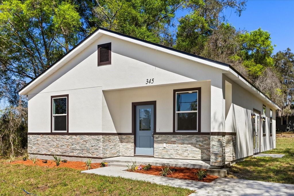 Photo of 345 W Plymouth Avenue, Deland, FL 32720 (MLS # O6392208)