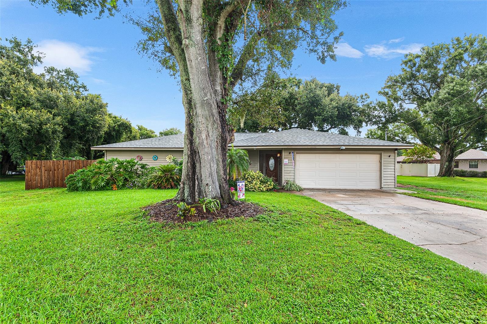 3 Bedroom Pool Home with Outdoor Entertaining & No HOA! This inviting 3 bedroom, 2 bath pool home offers the perfect mix of comfort, function, and fun. Inside, you’ll find wood-look tile throughout, granite countertops, and new lighting that gives the space a fresh, modern feel. The living room’s wood-burning fireplace adds a cozy touch, making it the perfect gathering spot year-round. Step outside to your own backyard oasis featuring a gorgeous refinished pool, complete with an outdoor bar and grill area, Ideal for entertaining or relaxing weekends at home. The pool system is top-notch, with a 2023 pump, solar-powered skimmer, and robot vacuum for easy maintenance. Practical upgrades make this home worry-free, including a 2023 roof with hurricane straps and clips, wired generator plug, solar attic exhaust fan, and tons of storage throughout. And with no HOA, you’ll enjoy true freedom and flexibility. All of this in a prime location, just minutes from the TECO Trail for walking and biking and the Polk Parkway for an easy commute to Tampa or Orlando. This home truly has it all: style, upgrades, location, and the ultimate Florida lifestyle.