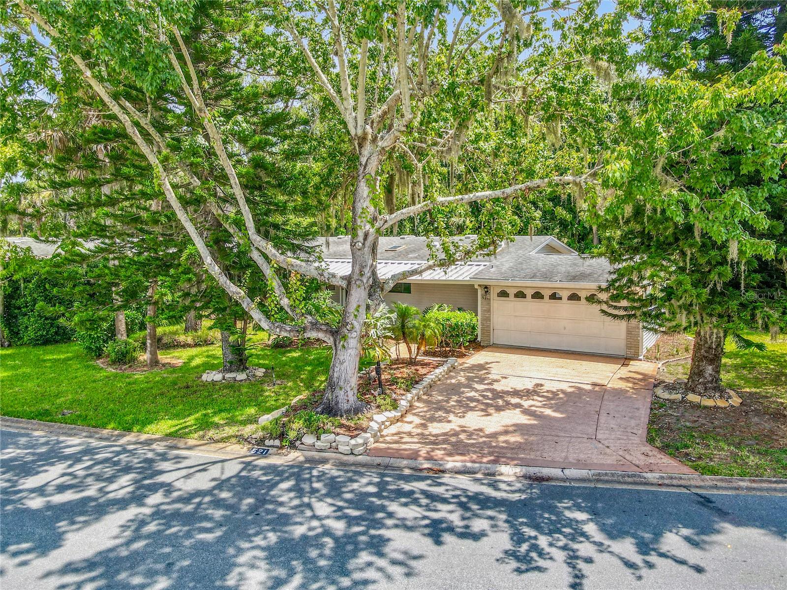 * * * RESORT-STYLE LIVING IN EDGEWATER LANDING – ENJOY TRUE FLORIDA HOMEOWNERSHIP WITH DEEDED LAND – NO LOT RENT
! * * *
2-bedroom, 2-bathroom manufactured home located in the highly sought-after 55+ gated community of Edgewater Landing. This spacious home features a 200-square-foot Florida room, an oversized 2-car garage, and sits on a private homesite with mature trees and a conservation area behind, offering both privacy and natural shade.
Inside, the kitchen is outfitted with all-new stainless steel appliances. The home also has a brand new HVAC system to ensure year-round comfort. This active waterfront community offers a wide range of amenities included in the low HOA fee, such as internet, cable, a resident-only boat ramp with direct access to the Intracoastal Waterway, and on-site boat and RV storage when available.
Residents enjoy a heated pool, hot tub, and a vibrant social calendar. The clubhouse and fitness center are currently being rebuilt and will soon offer brand-new facilities. Sports lovers can take advantage of pickleball, tennis, bocce, and shuffleboard courts.
Conveniently located just 5 minutes from a Publix shopping center and a short drive to additional dining and retail options, this home is also only 20 minutes from the sparkling sands of New Smyrna Beach. The community is also a short drive to Daytona Beach Airport.
This is your chance to experience resort-style living every day in a thriving, friendly, and fun-filled community.