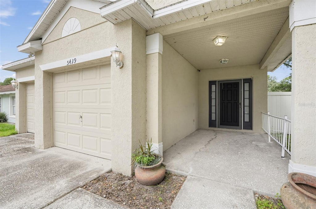 Photo of 5439 Gaucho Way, Orlando, FL 32810 (MLS # GC543748)