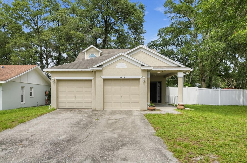 Photo of 5439 Gaucho Way, Orlando, FL 32810 (MLS # GC543748)