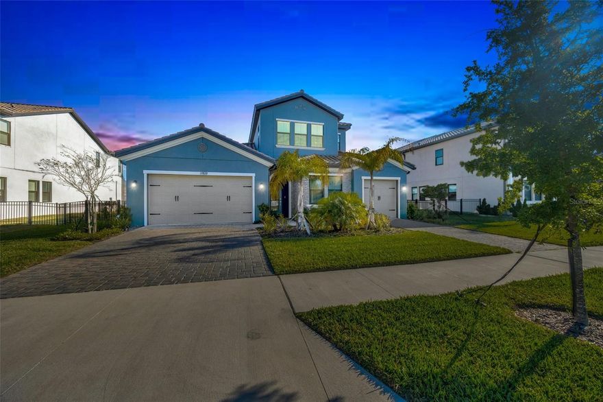 One or more photo(s) has been virtually staged. Luxurious Tarramor Estate | Grand 2-Story Layout with Elite Custom Upgrades. Discover the perfect blend of builder luxury and bespoke customization in this stunning 2-story "Modesto" model. Located in the highly sought-after Tarramor community, this home has been meticulously elevated with over $50,000 in post-construction enhancements, offering a turn-key experience that far exceeds new construction standards. The expansive open-concept layout is defined by elegance, featuring custom crown molding and designer chandeliers throughout that stay with the home. The formal dining room is an entertainer’s masterpiece, professionally upgraded with a custom built-in bar, cabinetry, and a dedicated beverage fridge. Practicality meets luxury with custom-designed closet systems installed in all four bedrooms and a whole-home reverse osmosis system for premium water quality throughout. The second story is dedicated to a massive bonus room, which comes fully equipped with an included 100-inch TV. Outdoors, the living space extends to a newly screened-in patio and a fully fenced backyard, providing a private sanctuary for relaxation. Residents of this gated enclave enjoy resort-style amenities including a clubhouse, fitness center, and pool, all with the significant financial benefit of no CDD fees. This prime Odessa location is zoned for highly-rated schools including Hammond Elementary, Martinez Middle, and Steinbrenner High School, offering a perfect blend of luxury, community, and top-tier education.