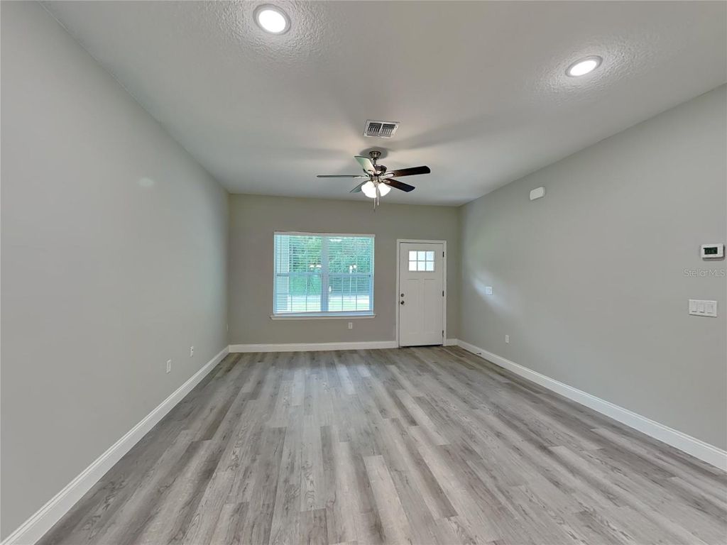 Photo of 11604 N Kenlake Circle, Citrus Springs, FL 34434 (MLS # O6353897)