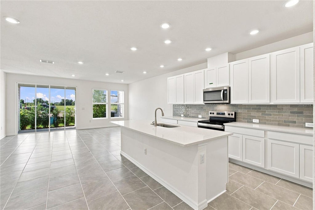 Photo of 6355 Jensen View Avenue, Apollo Beach, FL 33572 (MLS # TB8517052)
