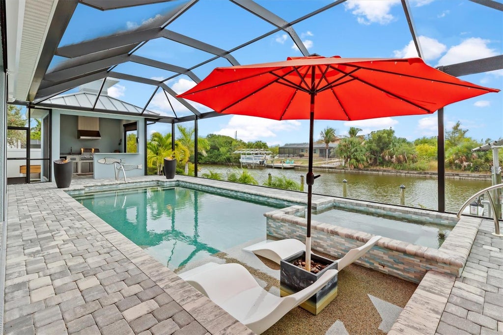 Photo of 15650 Meacham Circle, Port Charlotte, FL 33981 (MLS # C7528163)