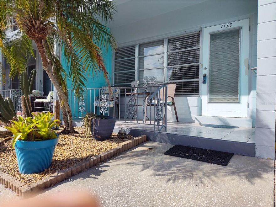 GROUND FLOOR condominium at the east end of the condominium complex features NEWER ELECTRIAL PANEL, DRYER in Florida room, WALK-IN Shower in bathroom with NEWER wall tiles and shower tiles. laminate flooring in living room, kitchen, and bedroom, CENTRAL AC and heating, and sitting area on both your FRONT PORCH and the BACK OPEN PATIO. This MID-CORNER condo is located next to breezeway where mailboxes are, and the assigned parking space is steps away from this condo. Being the LARGER STYLE 1-bedroom condo, this unit starches from the front to the back of the building. Not facing another building, this building offers a little more privacy than buildings on some other streets. TENTING was completed in JANUARY OF 2025. NEW STAINLESS-STEEL FRIDGE (DECEMBER 2025) Furniture is out, and it is ready for new owner. There is no land lease or land lease fee; just one fee to the association and that monthly fee to the association includes CABLE, INTERNET, Wi-fi, water, sewer, trash removal, maintenance of the exterior common elements, and insurance of the building exterior while buyer is advised to get insurance for the interior. The building is in X zone that is presently NON-EVACTUATION zone and does not require flood Insurance to be paid by the association. This PET-FRIENDLY complex located in Kenneth City is within the north-west part of St. Petersburg. Approximately 7 miles away from each Madeira Beach and St Pete Beach, this complex is located about 4 blocks east from Clearview Oaks Management Condominium Association's shuffleboard court and a clubhouse with a library, a pool-table, and a piano.