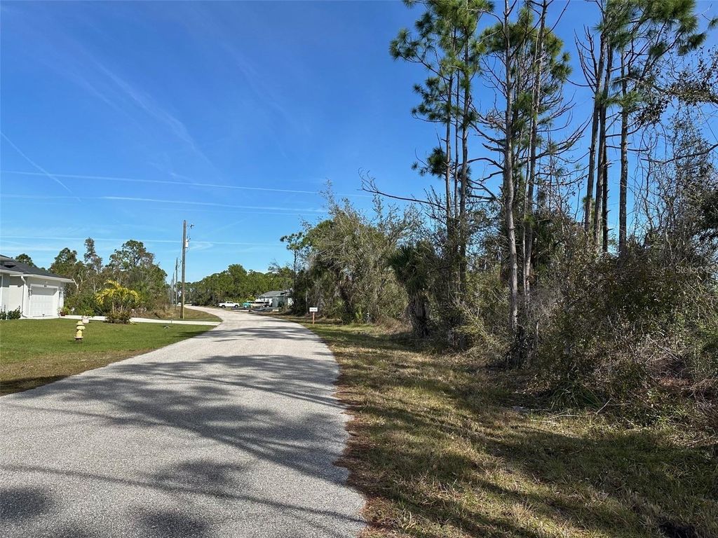 Photo of 8250 Dittmar Street, Port Charlotte, FL 33981 (MLS # TB8377782)