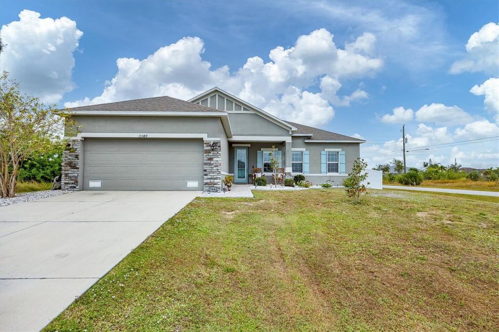 Photo of 15589 Mccomb Circle, Port Charlotte, FL 33981 (MLS # D6144206)