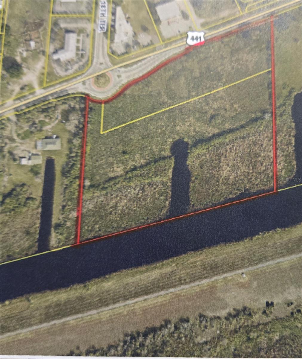 14 +/- Acres in Okeechobee Fl, Zone Multi Family/commercial with a special exception for 18 units to the Acres, frontage on Hwy 441 and on
Okeechobee rim canal, access to Lake Okeechobee (2 nd largest freshwater lake in the US) Lock access to the lake is .5 +/- miles from property, municipal sewer, municipal water and utilities available, great location for apartments, condominium or hotel