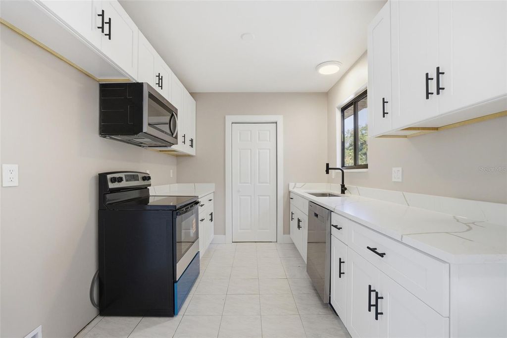 Photo of 400 Kenova Street, Port Charlotte, FL 33954 (MLS # C7522191)