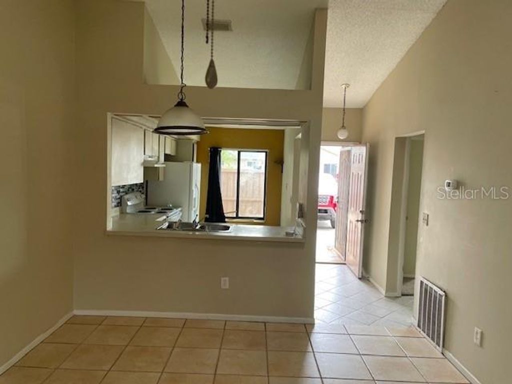 Photo of 2920 Eastern Willow Avenue, Orlando, FL 32808 (MLS # O6397054)