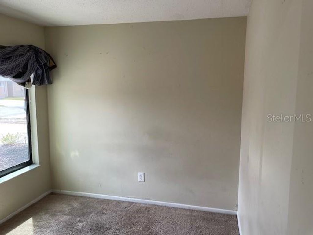 Photo of 2920 Eastern Willow Avenue, Orlando, FL 32808 (MLS # O6397054)