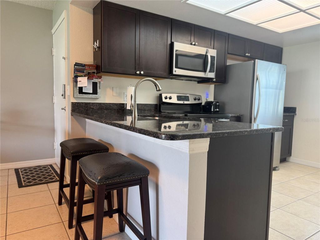 Photo of 115 Windward Place #15, Oldsmar, FL 34677 (MLS # TB8490824)