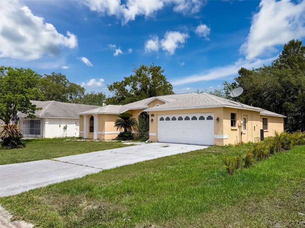 Photo of 7337 Cone Shell Drive, Spring Hill, FL 34607 (MLS # O6312973)