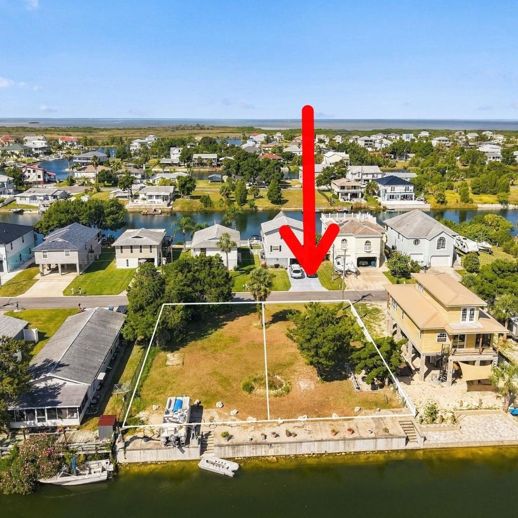 Photo of 3192 Sea Grape Drive, Hernando Beach, FL 34607 (MLS # TB8561199)