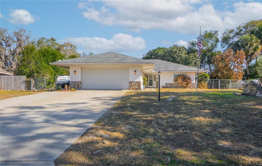 Beautifully maintained 3-bedroom, 2-bathroom, 2-car garage home nestled on a spacious .47-acre cul-de-sac lot in the desirable Rolling Greens Community. This spacious and well-designed home offers 1,875 square feet of living area and presents a split and open floor plan with vaulted ceilings, a gorgeous sunroom beaming with natural light, updated kitchen with thermofoil cabinetry and quartz countertops, an interior laundry room topped with a washer and dryer, and a primary suite with walk-in closet and full bathroom, dual sinks and shower. On the exterior you will find a covered entry, rear fenced yard, patio area, RV hookup with water, electric, and septic. Notable updates include a new roof in 2022, a new A/C system in 2024, and updated windows completed in 2016. This value packed home is located just minutes from downtown Inverness, the Withlacoochee River and bike trails, lakes, restaurants, schools, medical facilities, golfing and more making this home the perfect combination of comfort and convenience.