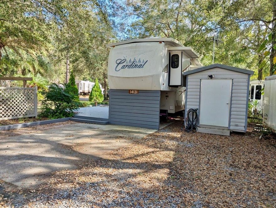 2004 Cardinal 5th Wheel w/ huge deck porch, gazebo, fire-pit, and shed. Unit is situated on a spacious corner lot (6,098sqft) w/ beautiful landscaping. Seller has recently replaced Lazy Boy Sofa, installed mini split unit, and installed hard plumbing in bathroom. 5th Wheel is furnished and turn key ready! The Salt Springs Resort offers club house, 2 pools, tennis courts, dog park, dock & boat ramp to Little Lake Kerr. Walking distance to restaurants, laundromat, post office, shopping, and the springs. Perfect for weekends or full-time residence. HOA fee is $706/quarter. Salt Springs is a nice, quaint area located in the Ocala National Forest.