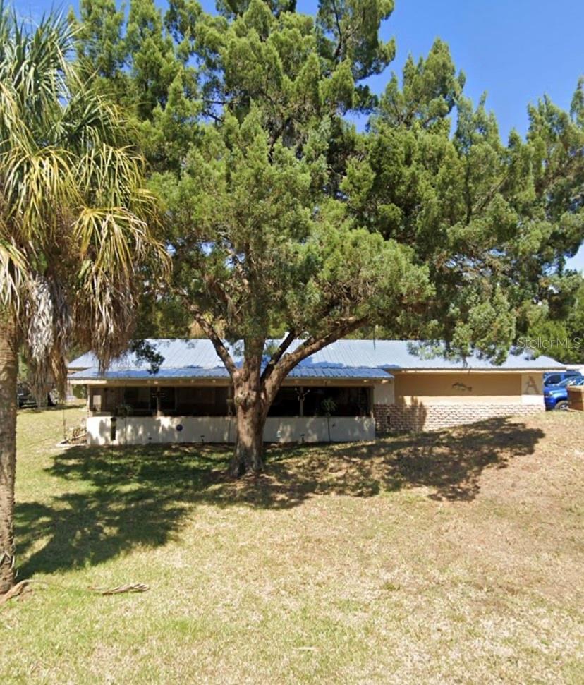 Waterfront fixer-upper with endless potential! This 2-bedroom, 1-bath home sits on a .35-acre lot with water on two sides, offering exceptional views and access. Enjoy a private boat lift and boat ramp, making it ideal for boating and fishing enthusiasts. With some updating, this property could be transformed into the perfect full-time residence, vacation retreat, or investment opportunity. Conveniently located near shopping, dining, and recreation. A rare chance to own affordable waterfront living with incredible potential!
Septic pumped & inspected 2024
New hot water heater
Metal roof installed 3/9/2023