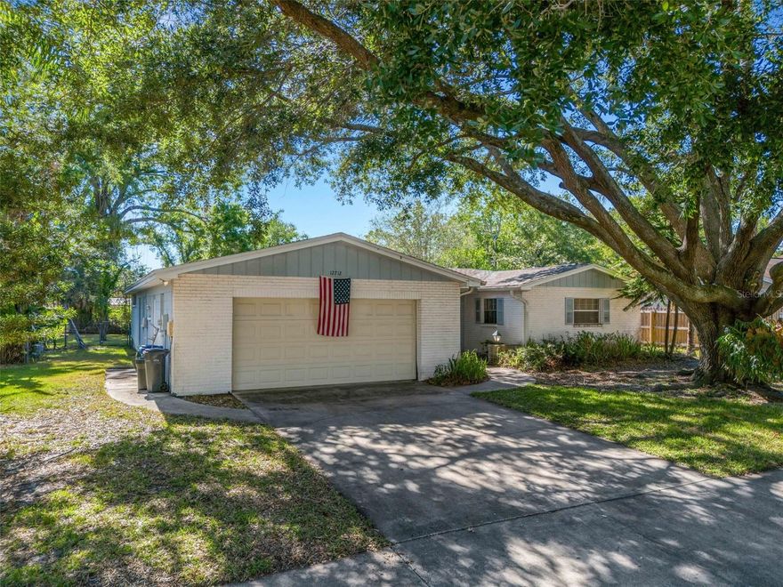 Welcome to 12712 Sebring Blvd, a spacious 4-bedroom, 2.5-bath pool home nestled in the heart of Carrollwood — one of Tampa’s most established and sought-after communities. Located on a quiet, mature tree-lined street with no HOA, this property offers the perfect blend of charm, space, and convenience.

Step outside and enjoy your own private backyard retreat featuring a large fenced yard and pool — ideal for entertaining, relaxing weekends, pets, or family gatherings under the shade of beautiful mature oak trees.

Inside, the home offers warm and cozy character throughout with inviting living spaces, oversized windows that bring in natural light, and timeless architectural details. The spacious layout includes multiple living and dining areas, creating flexibility for both everyday living and entertaining. The home’s comfortable design and classic finishes provide the perfect opportunity to enjoy as-is or personalize to your own style.

Conveniently located just minutes from Dale Mabry Highway, I-275, shopping, dining, and everyday conveniences. Enjoy close proximity to popular Carrollwood destinations including Whole Foods, Publix, Target, Carrollwood Village Park, and local favorites like Sacred Pepper, Fresh Kitchen, Noble Crust, and GrillSmith.

If you’ve been searching for a home with character, space, a pool, and an unbeatable Carrollwood location with no HOA restrictions, this is one you won’t want to miss.