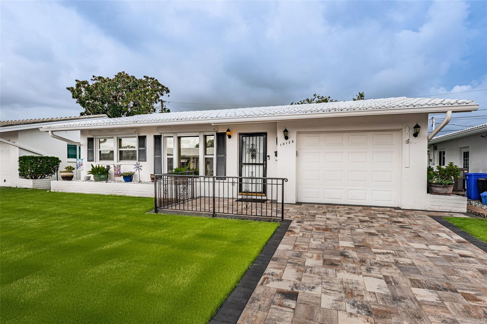One or more photo(s) has been virtually staged. Welcome to Carefree 55+ Living in The Mainlands!
This beautifully updated 2-bedroom, 2-bath home with a 1-car garage is tucked away on a quiet street in the highly sought-after Mainlands of Tamarac, a vibrant 55+ community in Pinellas Park. Offering an active lifestyle and a low-maintenance way of living, this home is move-in ready and packed with desirable updates.
Inside, you’ll find solid wood floors in the main living areas, a bright and spacious layout, and a thoughtfully renovated kitchen featuring rich wood cabinetry, granite countertops, and plenty of storage. Both bathrooms have been tastefully updated, with the primary bath boasting a walk-in shower for comfort and convenience. Plantation shutters, double-paned windows with hurricane shutters, and an updated electrical panel (2018) provide peace of mind. Additional updates include a new water heater (2024) and brand-new sod (to be installed) for the yard.
The home’s curb appeal shines with a beautifully paved driveway and front porch, welcoming you with charm from the moment you arrive.
Beyond your front door, enjoy the Mainlands Golf Course right inside the community and a calendar full of social activities. Just minutes away, relax at Madeira Beach or Treasure Island (under 15 miles), explore the Salvador Dalà Museum (10 miles), hike at Weedon Island Preserve (7 miles), shop at Tyrone Square Mall (8 miles), or take a quick trip to Busch Gardens Tampa Bay (20 miles) for endless excitement.
With its prime location, stylish updates, and vibrant community, this Pinellas Park gem is the perfect blend of tranquil living and nearby adventure. Don’t miss your chance to call it home!