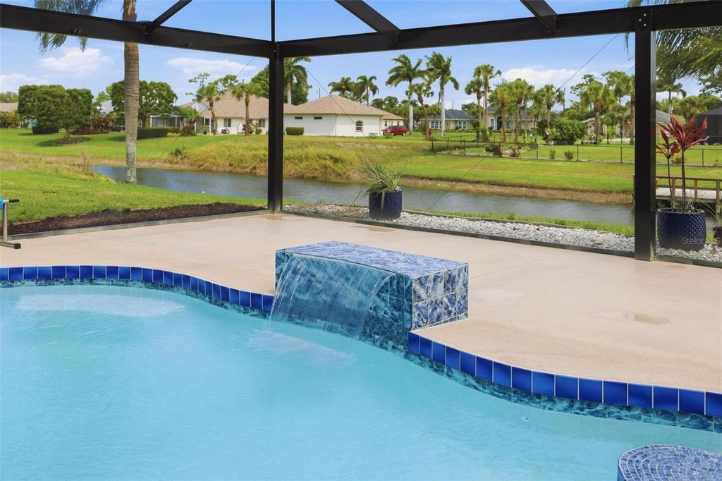 Photo of 605 Rotonda Cir, Rotonda West, FL 33947 (MLS # N6143670)