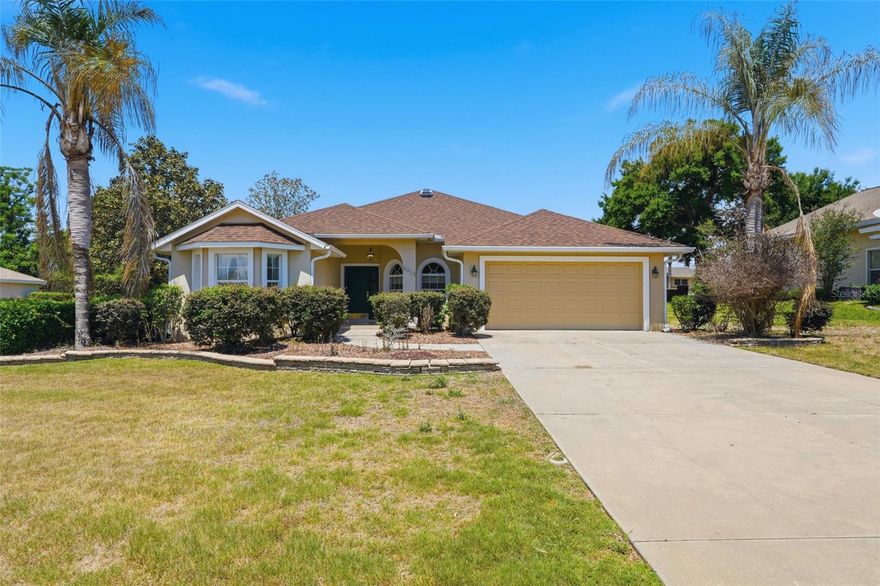 Tucked away in the desirable Harbor Hills championship golf course community, this inviting home presents the perfect blend of comfort, style, and Florida living. From the moment you arrive, you’ll appreciate the well-maintained exterior, mature landscaping, and welcoming curb appeal. The home features a bright and open floor plan designed for both everyday living and entertaining. Spacious living areas are filled with natural light, complemented by neutral finishes that create a warm, inviting atmosphere. The kitchen delivers ample cabinetry and counter space, making meal prep a breeze while staying connected to the main living areas. The primary suite provides a relaxing retreat, complete with generous closet space and a private bath. The split floorplan includes the large additional bedroom and the office / flex / additional bedroom, along with the second bathroom. Ceiling fans, solar tubes, gutters, 5 1/2" baseboards throughout, double paned windows with marble sills, coffered ceilings and glass French doors are some of the great features. You will spend many hours in the large 435sqft enclosed Florida room under heat and air with a summer kitchen and is not included in the recorded square footage. Step through the triple sliding glass doors to enjoy your own slice of Florida paradise—whether it’s sipping morning coffee or hosting gatherings, the outdoor space offers room to relax and unwind.