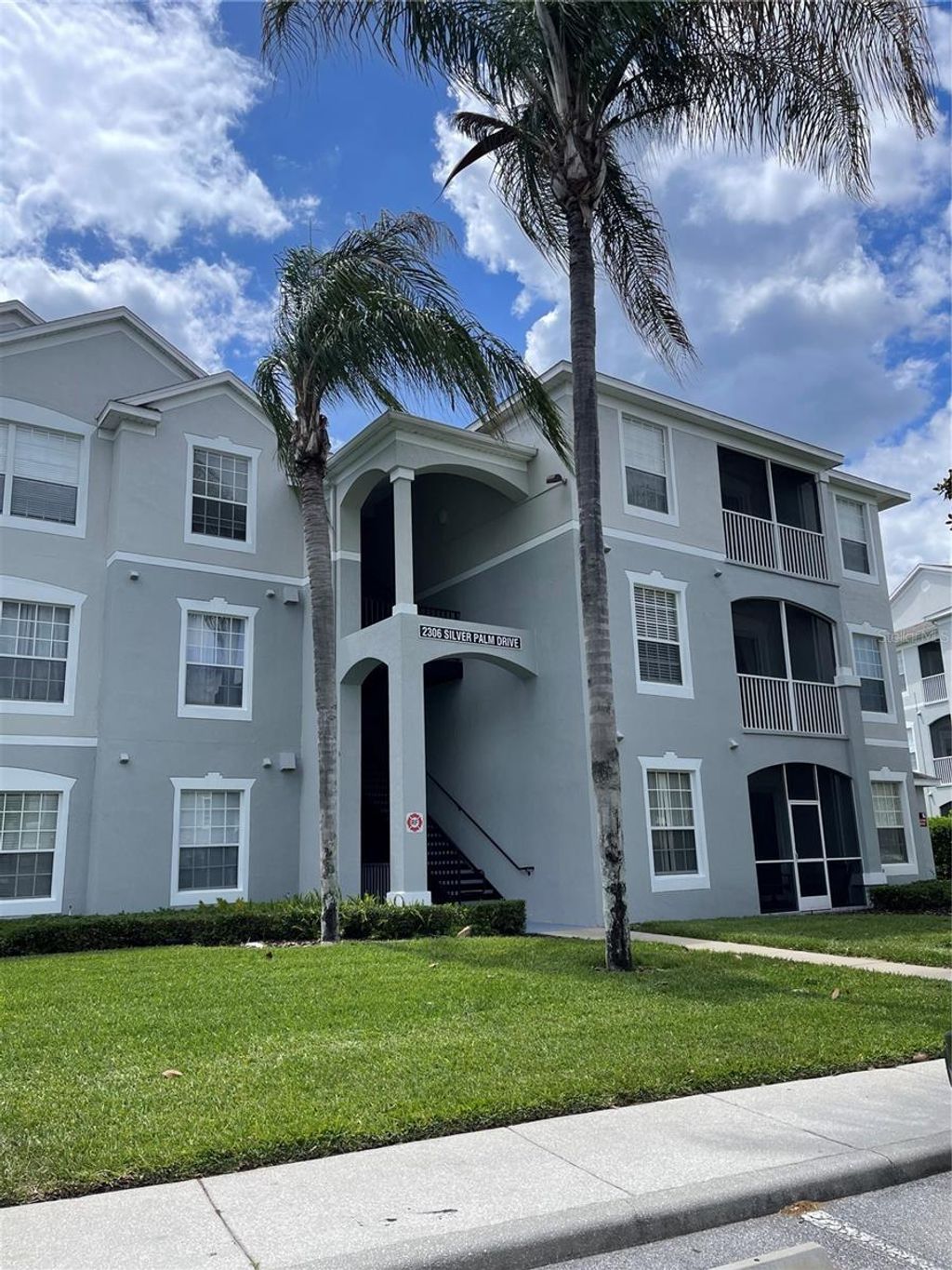 Photo of 2306 Silver Palm Drive #105, Kissimmee, FL 34747 (MLS # O6401947)