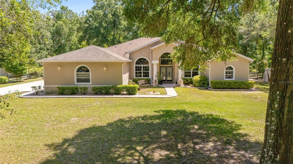 Photo of 4060 S Kenvera Loop, Inverness, FL 34450 (MLS # OM722826)
