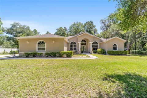 Photo of 4060 S Kenvera Loop, Inverness, FL 34450 (MLS # OM722826)