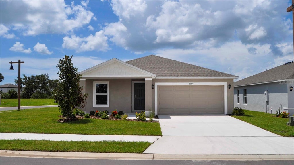 Photo of 12407 Hopscotch Avenue E, Palmetto, FL 34221 (MLS # A4694102)