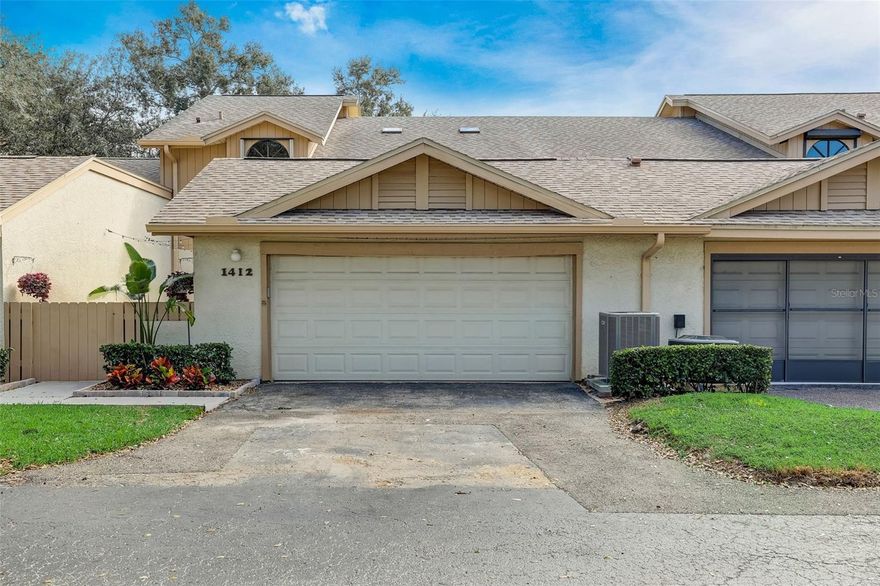 Step into this fully renovated 3-Bed, 2.5-Bath located in Island Green Villas Townhome. This residence underwent a comprehensive makeover in 2023, offering a seamless blend of sophistication and functionally. The Kitchen, a chef's dream features new shaker cabinets, quartz countertops, a deep single-bowl sink, and brand-new slate appliances. All new vinyl plank flooring for downstairs with two bedrooms and connected renovated guest bathroom. Additionally access to a large Sunroom with added wet bar. Continue up the new stair thread and risers, you'll have access to a large loft area with brand new laminate flooring. Large primary bedroom with new herringbone wood plank tile in the screened-in balcony outside of primary bedroom. Additional features include a fold-away work bench, foam insulated garage door and hurricane shutters. 4 Ton AC/Condenser 2020. Reroof 2019. Prime location from shopping, restaurants, and an easy ride to the beaches. This townhome encapsulates a perfect belnd of luxury, functionality and convenience.