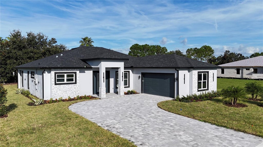 Photo of 151 Blazing Star Avenue, Lake Alfred, FL 33850 (MLS # W7889876)