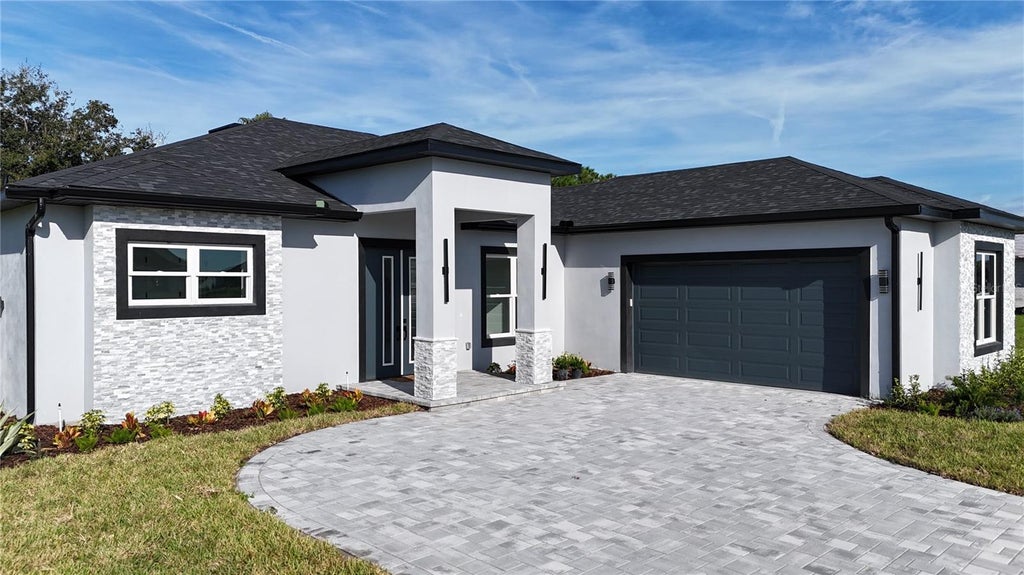 Photo of 151 Blazing Star Avenue, Lake Alfred, FL 33850 (MLS # W7889876)