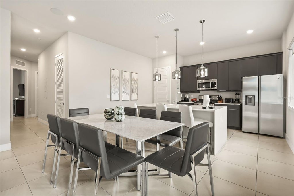 Photo of 7770 Sandy Ridge Drive #114, Reunion, FL 34747 (MLS # O6438373)