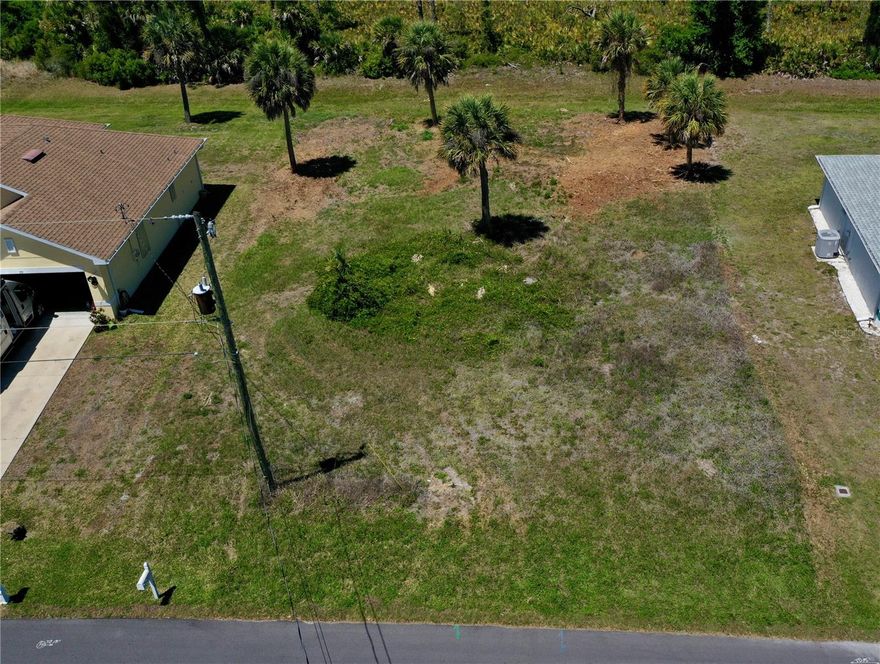 Build your Florida dream home on this prime residential lot located in the highly desirable "Long Meadow" area of Rotonda West. This 8,799-square-foot homesite offers 76 feet of road frontage and generous dimensions of 76x110x85x110, providing ample space for a sprawling custom floor plan and a private pool. Convenience is built-in with public water and sewer utilities available, and a major development hurdle is already cleared as the property is NOT located in a scrub jay review zone according to the Charlotte County GIS map. Nestled within a premier deed-restricted golfing community, you’ll have easy access to five championship golf courses, including The Hills and Long Marsh, many of which are just a short golf cart ride away. Beyond the fairways, you are perfectly positioned for the ultimate Gulf Coast lifestyle—just 15 minutes from the world-class fishing and pristine beaches of Boca Grande and Englewood. Local favorites for shopping and dining at Port Charlotte Town Center are nearby, and sports enthusiasts will appreciate the proximity to the Port Charlotte Sports Complex, spring training home of the Tampa Bay Rays. With easy access to I-75 for commuting north or south located about 25 minutes away, this buildable lot represents a rare opportunity to secure your piece of paradise in one of Southwest Florida’s most established and active neighborhoods.