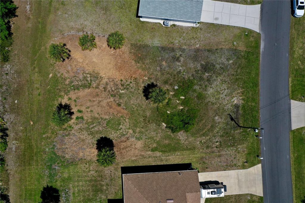 Photo of 135 Long Meadow Lane, Rotonda West, FL 33947 (MLS # C7524672)