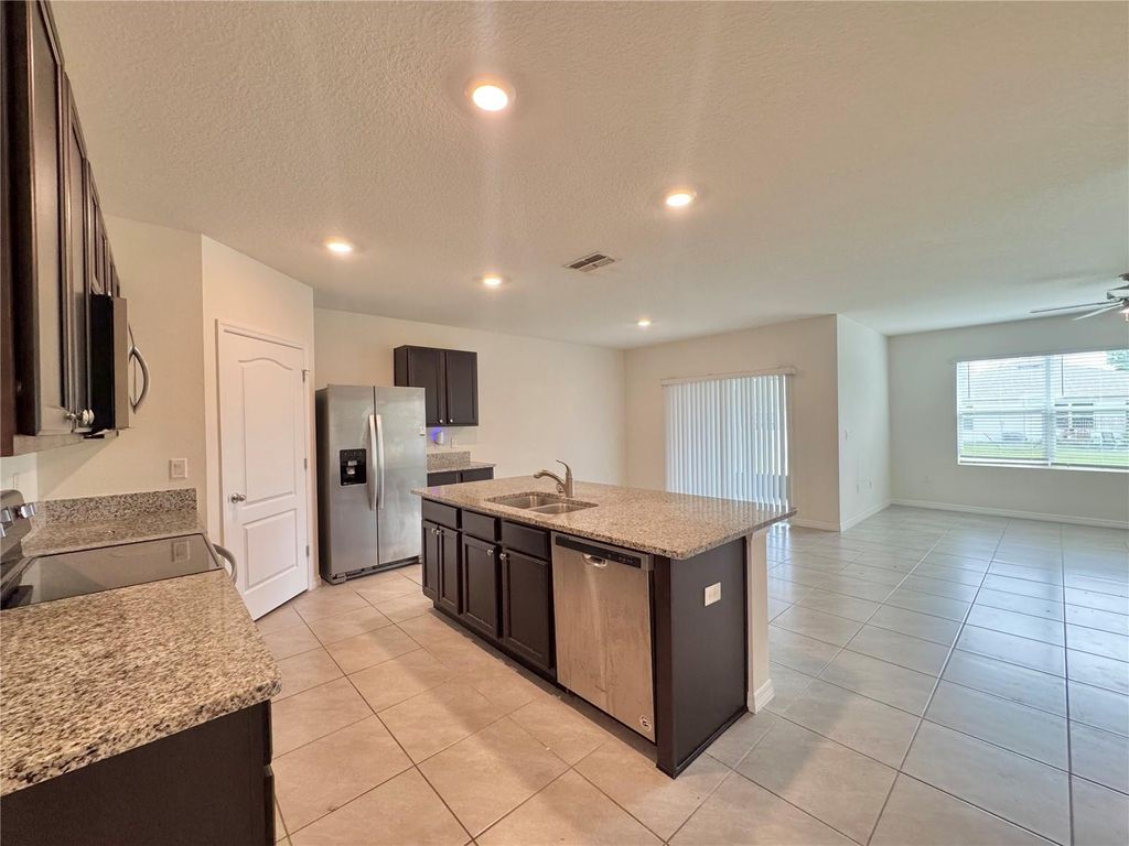 Photo of 632 Autumn Stream Drive, Auburndale, FL 33823 (MLS # P4938185)