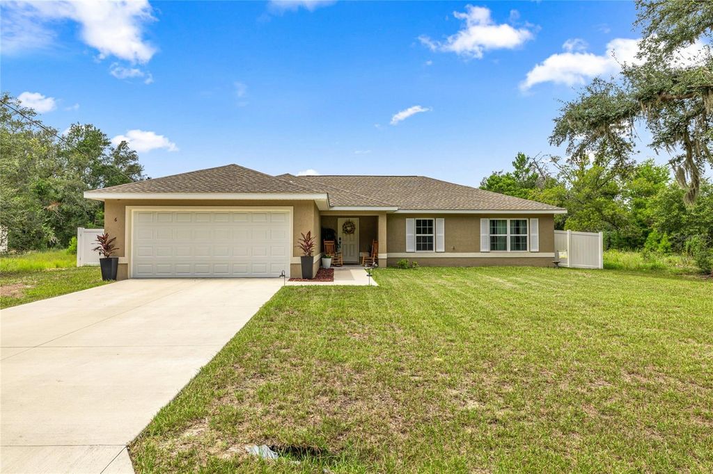 Photo of 6 Malauka Radial Lane, Ocklawaha, FL 32179 (MLS # OM708105)