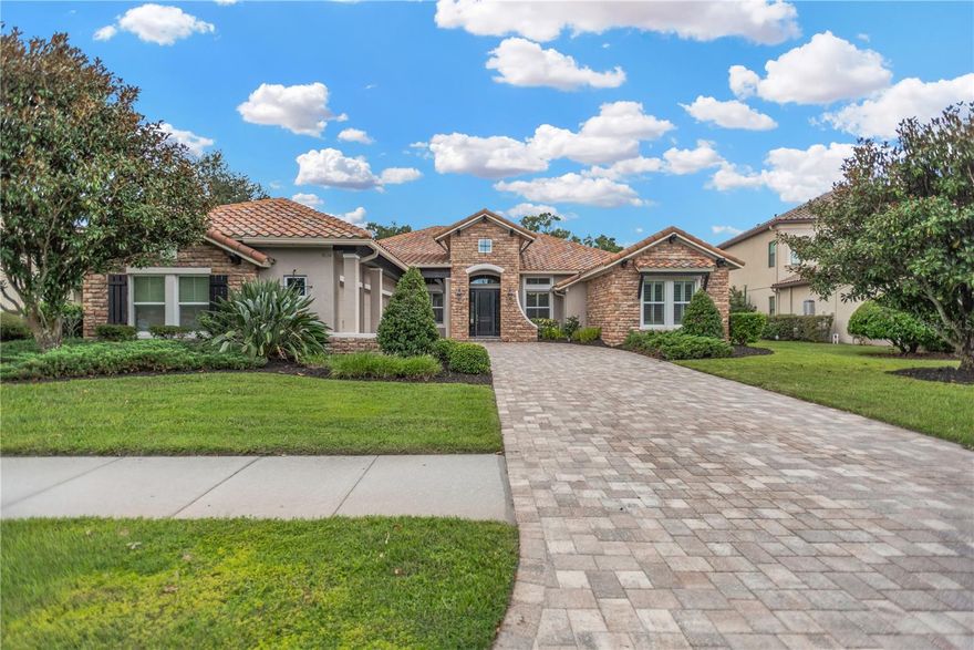 Meticulously maintained and generously appointed features, this wonderful home in the gated community of Old Memorial Estates is a rare find. With the oversized fenced lot, naturally maintained for privacy. The property has the opportunity to be cleared for views of the esteemed private Old Memorial Golf Course. Bring your pets, people and toys, as the durable engineered hardwood flooring and lovely contrast to the light quartz and stainless steel Viking appliances provide clean lines and luxurious comfortable living. Four bedrooms, including one with an en-suite bath gives amazing privacy to the primary bedroom and bath. The den or office to the front of the home is an added bonus in addition to the flex space off the kitchen. The flex space is a wonderful area for additional living needs for the new homeowner. Enjoy entertaining as the sliding doors pocket to open up to the expansive covered lanai and enclosed pool area. Recent updates such as whole-house water softener and updated Aqualink pool system. Cameras and lighting are used throughout the exterior for security. Interior cameras as well. LED lights throughout the home as well as inside the pool. This home is ready for you to move in and enjoy on day one.