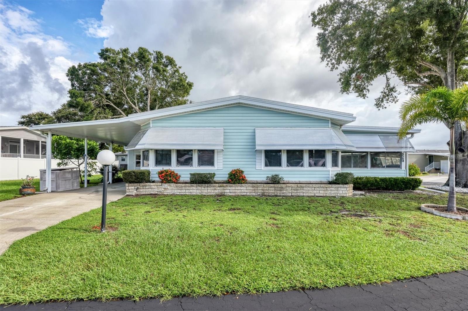 Charming 2-Bedroom, 2-Bathroom Home in Active 55+ Community
Welcome to this spacious and meticulously maintained 1990 double-wide manufactured home, offering 1,720 square feet of comfortable living space in the beautiful Terra Siesta community. Designed with seniors in mind, this home features upgraded windows, hurricane shutters, and two large patios—both with air conditioning, creating the perfect retreat.
Inside, you'll appreciate the gorgeous hardwood and tile floors throughout, with no carpet to maintain. The heart of the home is the bright and open kitchen, complete with wood cabinets, a central island with a Jenn-Air stovetop, and an exhaust vent—perfect for cooking and entertaining. The abundance of windows floods the space with natural light, enhancing the welcoming atmosphere.
The master suite is a true sanctuary, featuring a fully renovated bathroom with double sinks, a walk-in shower, and plenty of storage. With ample closet space, you'll have room for everything you need. The second bedroom is generously sized, with easy access to the second full bathroom.
You'll find even more space to enjoy with the large family room and living room—perfect for relaxing or hosting guests. Plus, the home is equipped with plenty of storage options, including a shed with a window unit that can easily be transformed into a workspace or hobby area.
As a resident of Terra Siesta, a 55+ co-op community, you’ll enjoy the benefits of homeownership with a twist—you own both the land and a share of the park itself. The low HOA fee includes access to all the fantastic amenities, including two swimming pools and a variety of community activities to keep you engaged and active.
The location couldn’t be better—conveniently close to shopping, dining, SRQ Airport, beautiful beaches, and easy access to Tampa, St. Petersburg, and I-75.
Come and discover the perfect place to enjoy your retirement in paradise!