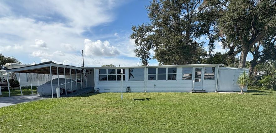 Space, updates, and freedom all come together on this double corner lot in one of Bradenton’s most unique communities! Here, YOU OWN THE LAND, WITH NO LOT RENT, NO HOA, NO DEED RESTRICTIONS, and NO AGE RESTRICTIONS—giving you the flexibility to live the way you want. This spacious home features a large addition nearly the size of the original home, creating room for a generous living area, an extra bedroom, and a flex room currently used as a third bedroom. The property also has 3 STORAGE SHEDS (all with floors), including ONE WITH ELECTRIC, plus a tandem driveway and carport that provide plenty of parking for vehicles, boats, or recreational toys. The major updates have already been taken care of, including NEW FRONT WINDOWS, NEW SIDING, NEW GUTTERS, and a BRAND-NEW ROOF (2025), master bathroom renovation—leaving you with peace of mind for years to come. Inside laundry shared with the guest bathroom, and the washer and dryer convey with the sale of the home.  Just minutes from the sugar-sand beaches of Anna Maria Island, the vibrant shops and dining of downtown Bradenton, area marinas, and convenient routes to Sarasota and Tampa Bay. Whether you’re looking for a full-time residence, a seasonal retreat, or an investment property, this home offers incredible potential in a one-of-a-kind setting.
